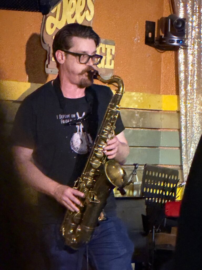 Nels Noseworthy playing saxophone at Dee's Lounge
